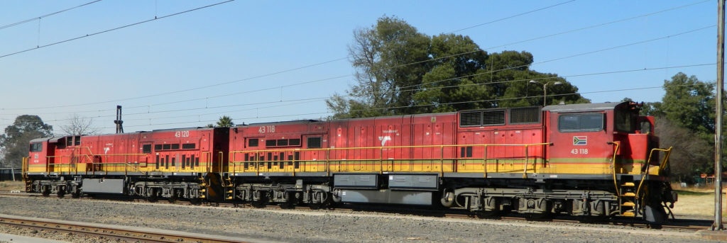 Transnet Class 43 GE C30ACi 43-118 and 43-120 at Ogies, SA © Bob Adams (license)