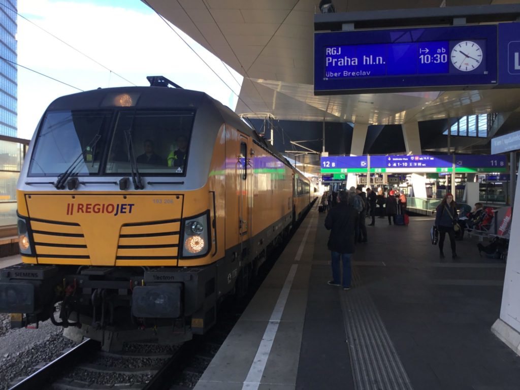 Yellow train at Wien Hauptbahnhof station