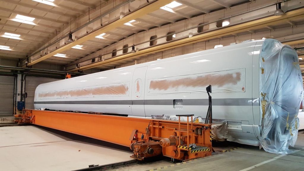 rolling stock powder coatings and wet coatings