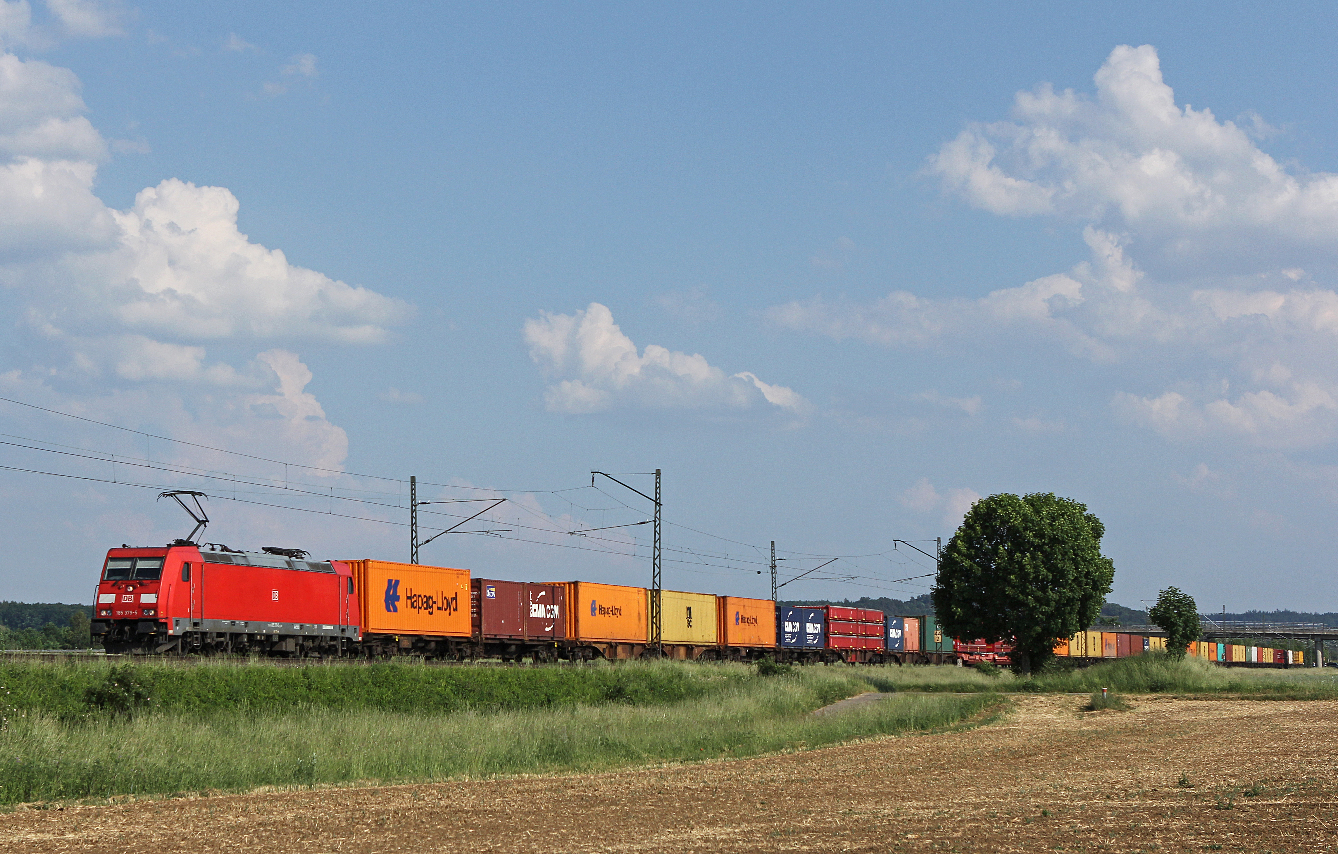 Electric locomotive hauling freight train