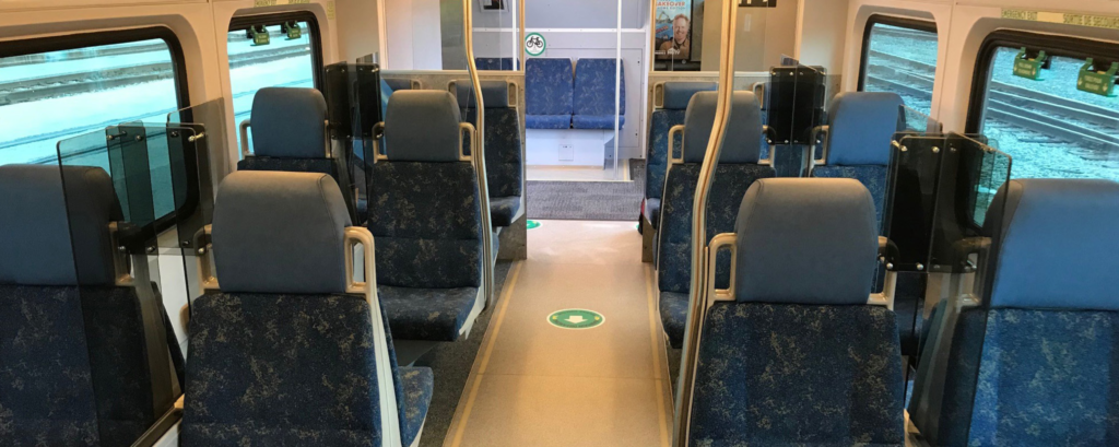 Train seat barriers and floor decals