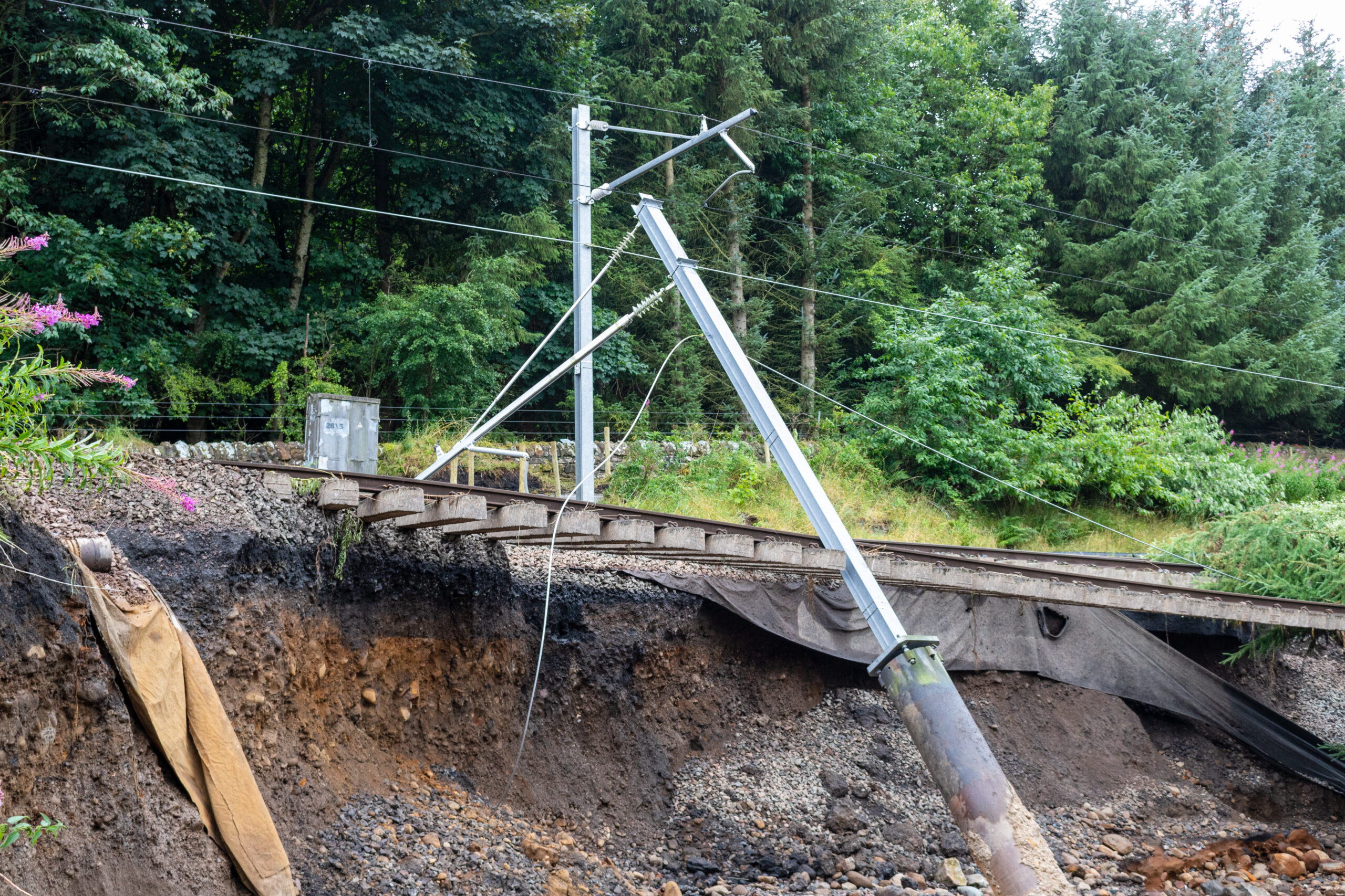 Close up view of flood damage to Glasgow Edinburgh railway line