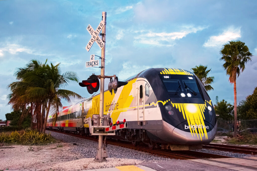 Brightline train at a level crossing in Miami