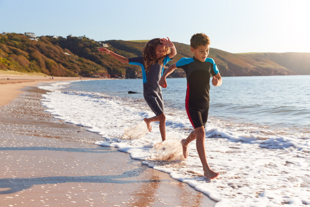 Children play on the beach