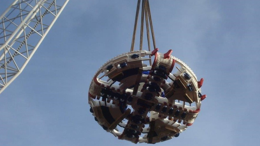 One of the cutter wheels for one of the Eglinton Crosstown West Extension’s tunnel boring machines being loaded onto a ship.