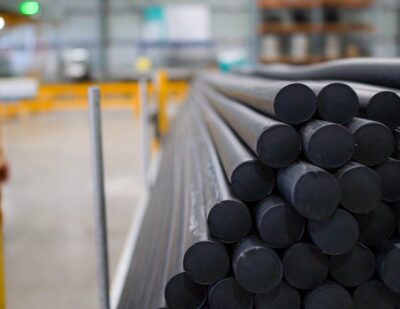 Derby Rubber – Long cylindrical rubber tubes laying flat in warehouse