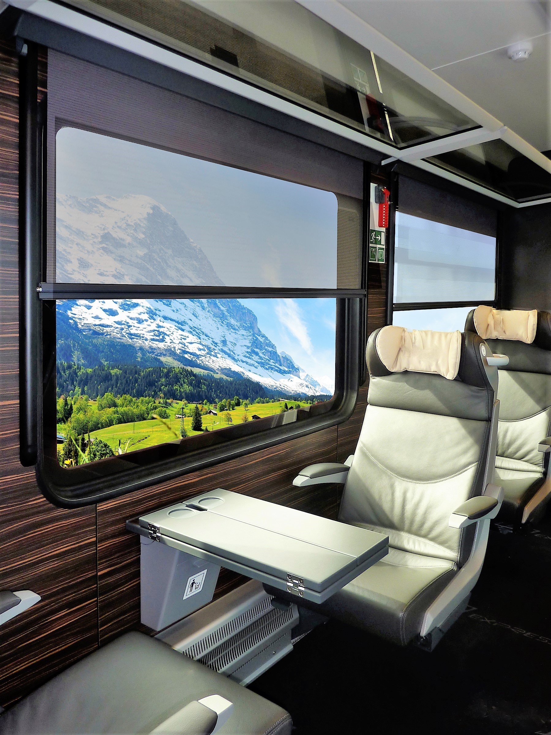 Roller blinds for passenger compartments