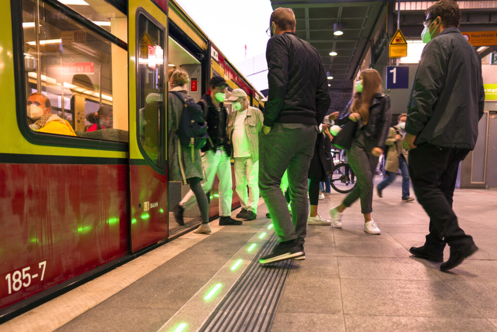 Luminous platform edge at Berlin Südkreuz station.