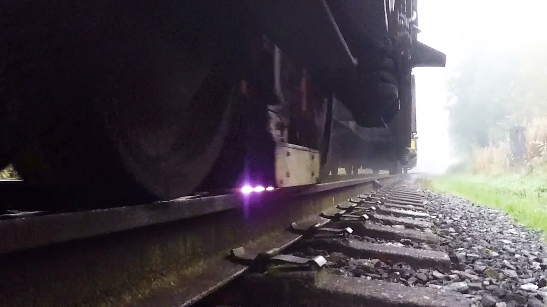 Trackside view of lasers treating the railhead
