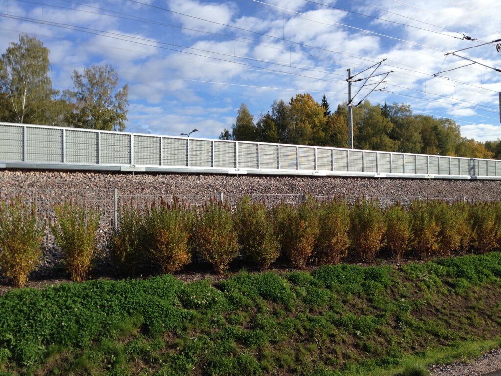 An image of sound barriers along a railway line