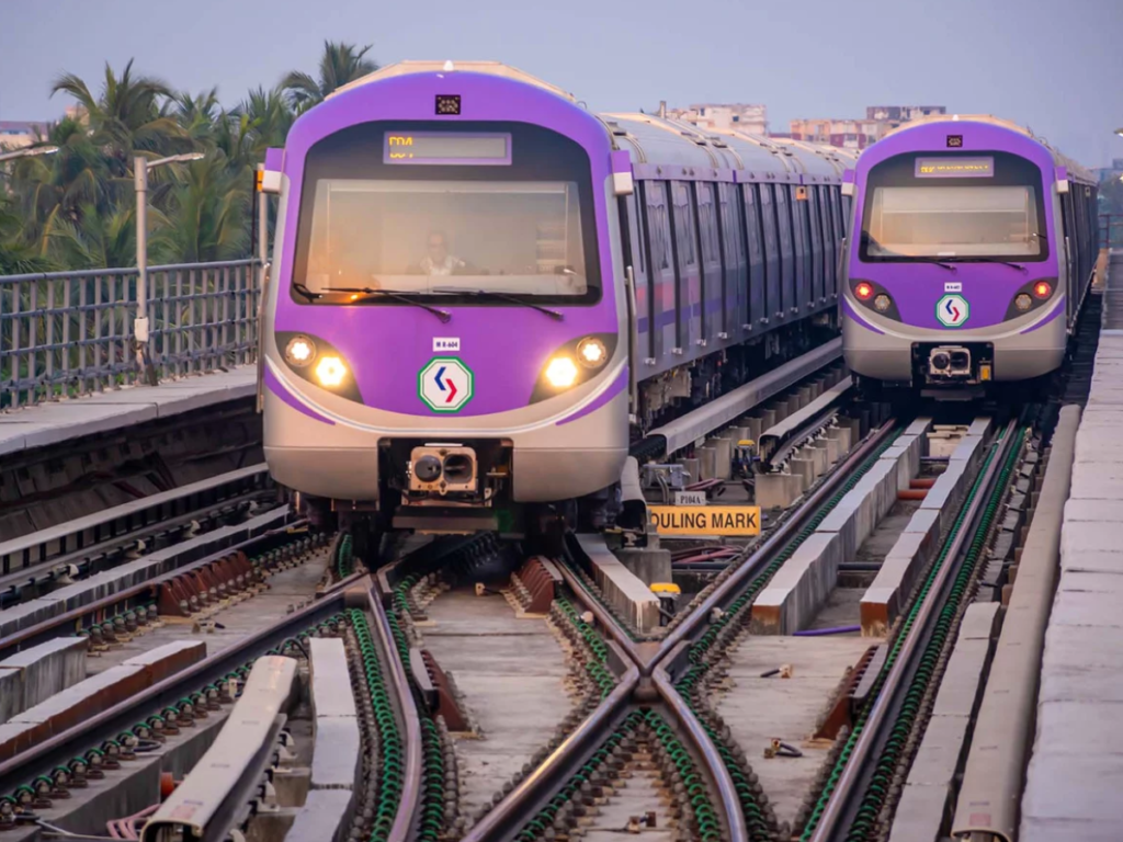 Two purple trains on the tracks