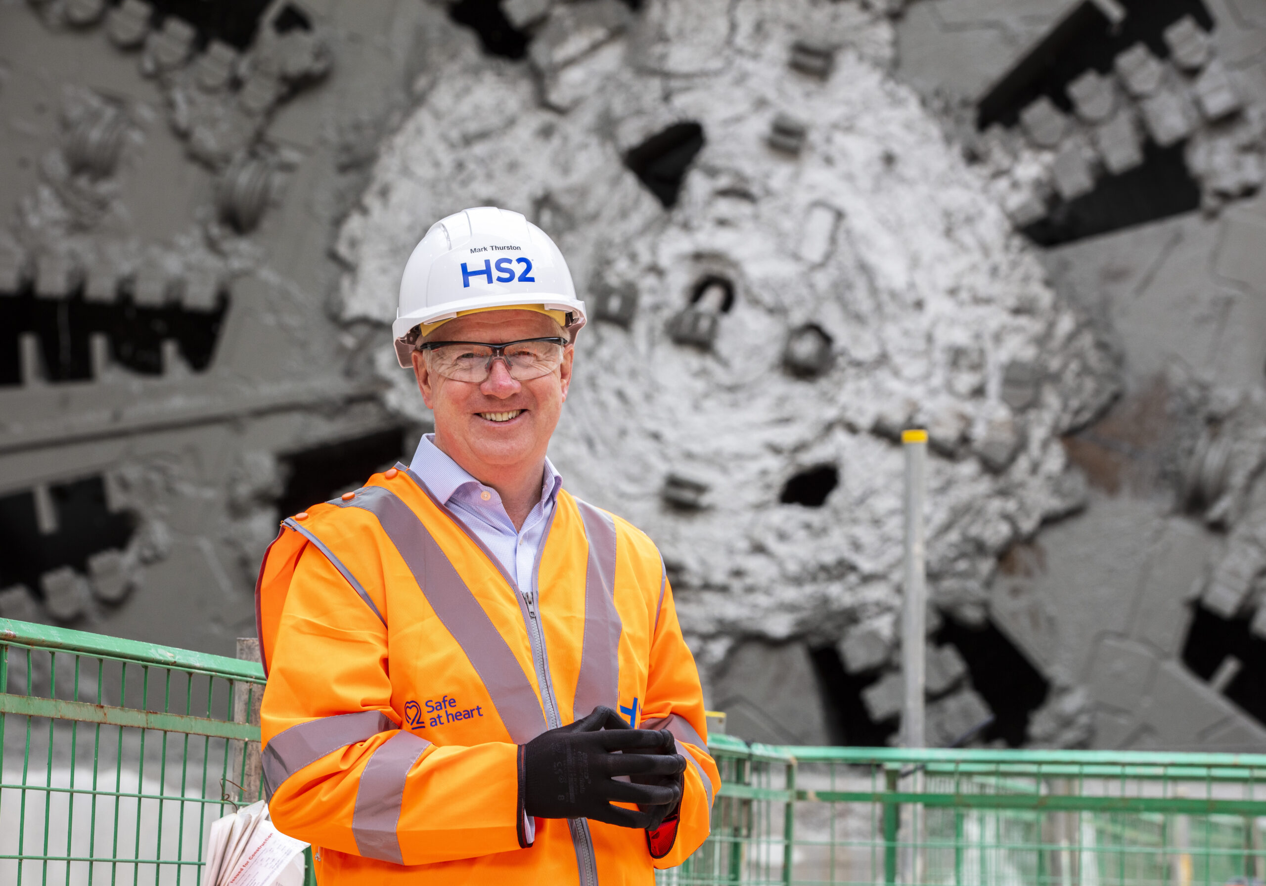 HS2 Ltd CEO Mark Thurston in front of a TBM breakthrough