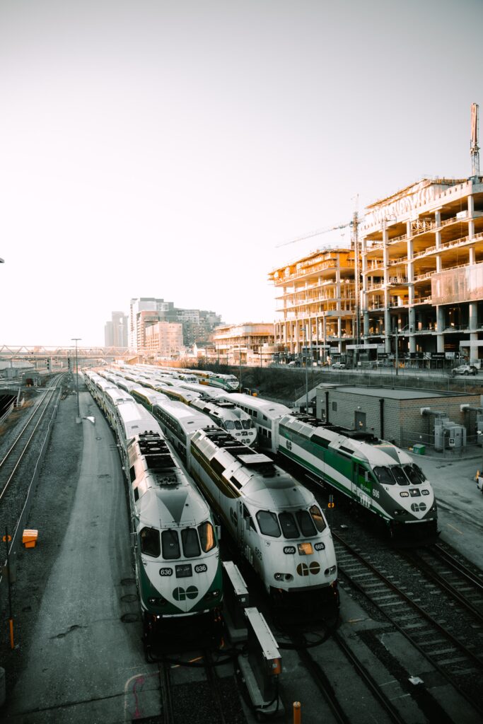 An image of three trains at a railway depot