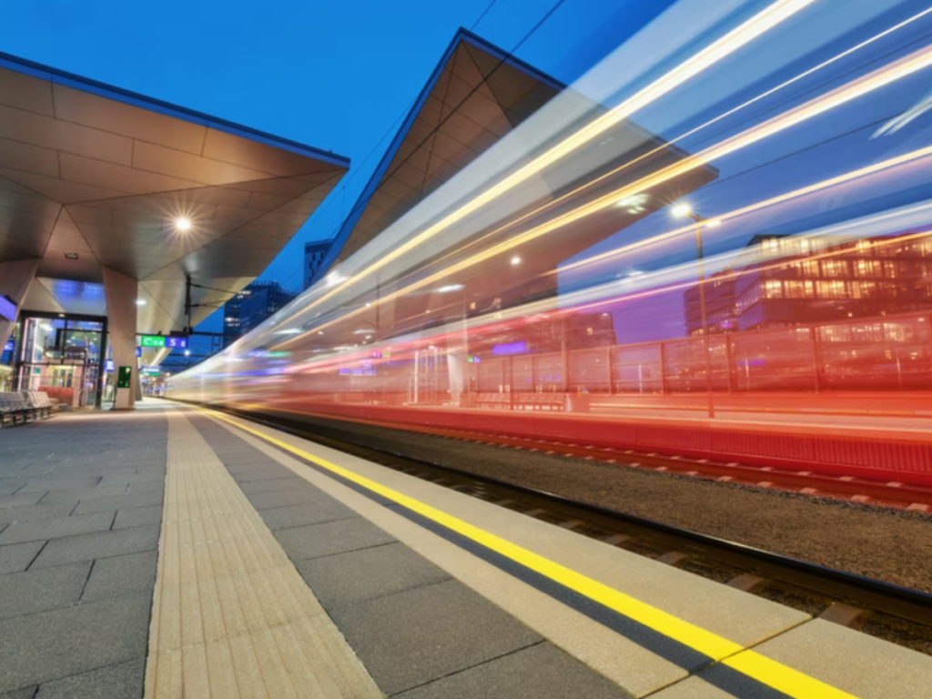 A train travelling quickly at night