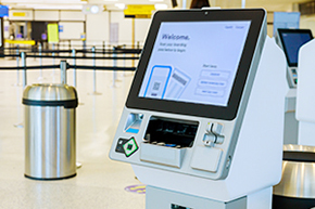A self check-in kiosk displaying ticket purchase options