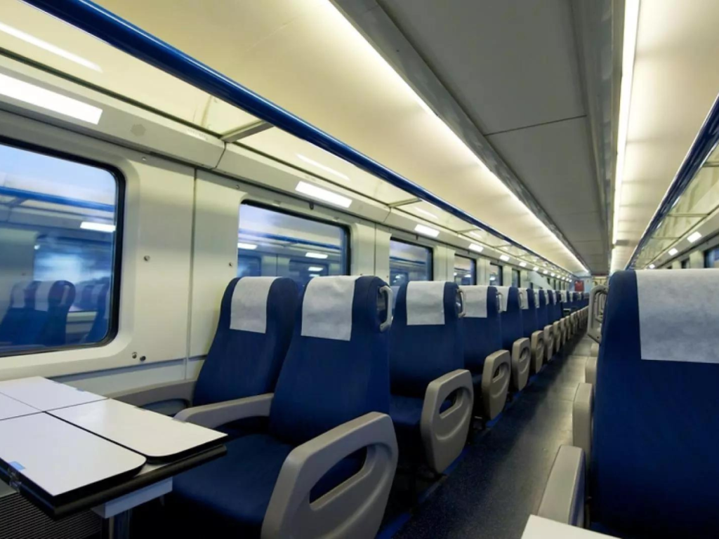 Passenger seats on the inside of a train