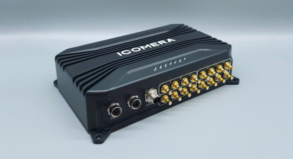 The Icomera A2-e: A black box with 16 golden antenna connectors on the front and 2 ethernet ports