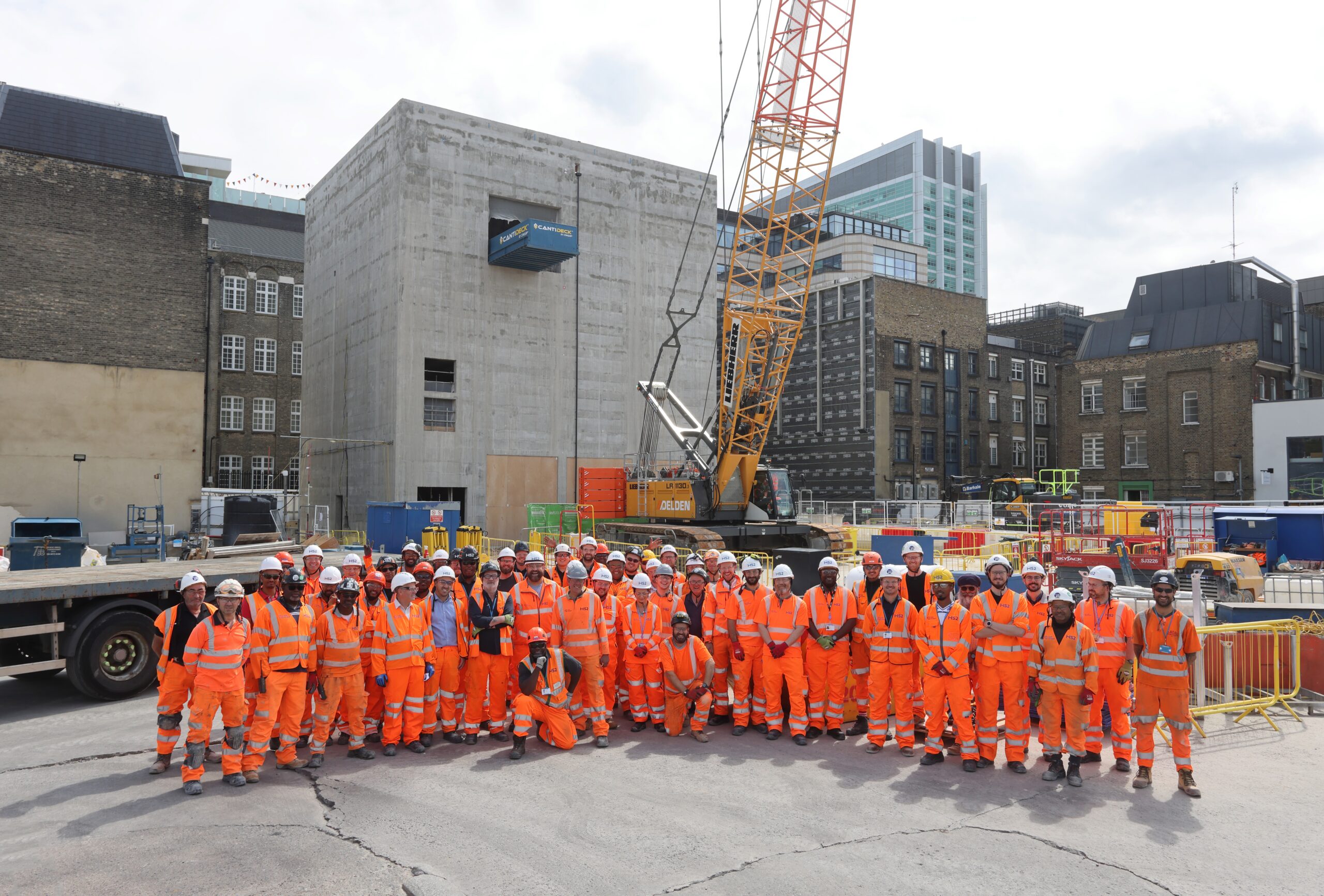 Workforce celebrate the completion of the structure of the Traction Substation for the Northern line