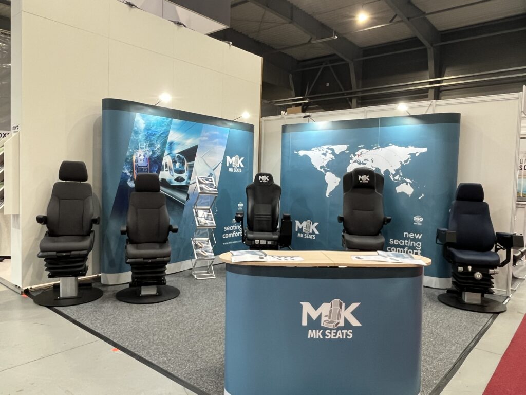 The MK-SEATS stand, including 5 of their train driver chairs
