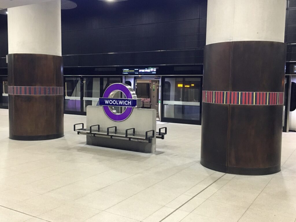 A sign for Woolwich Train Station