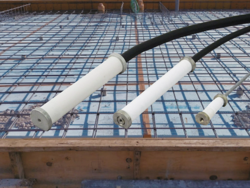 TML strain transducers installed on a reinforced concrete structure for structural health monitoring.