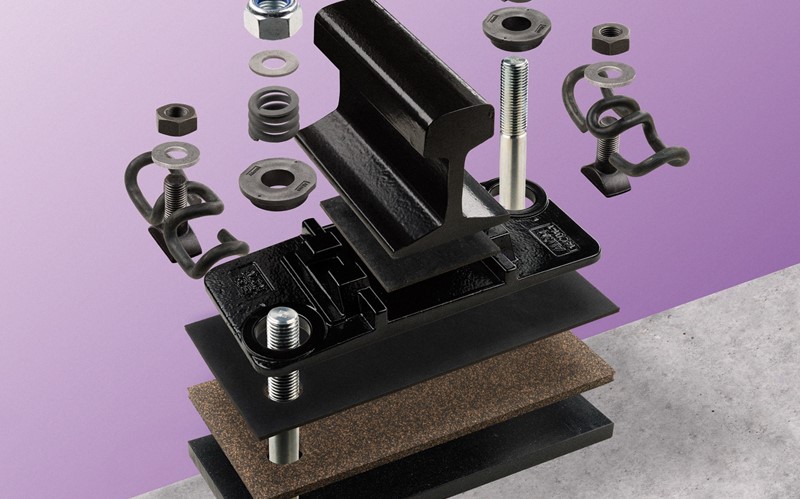 Diagram of a rail fastening system with nuts and bolts