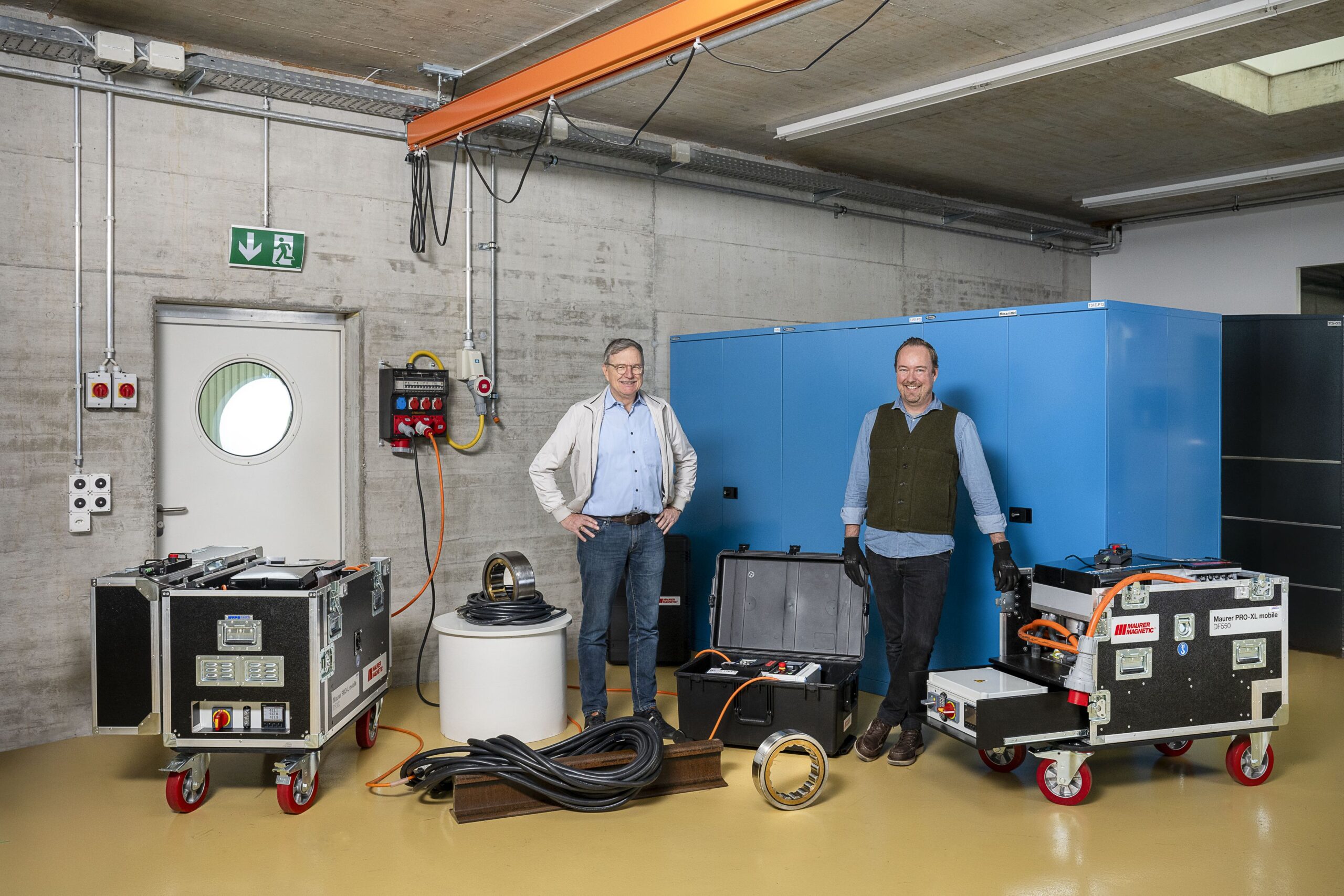 Albert Maurer (left, owner) and Christian Spiess (COO) with the three mobile demagnetisation systems: ‘Maurer PRO mobile’ © Thomas Entzeroth
