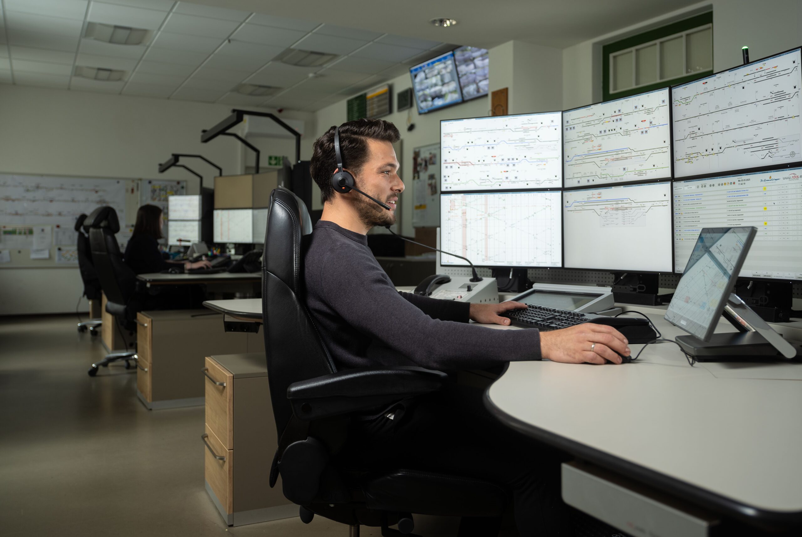 Dispatcher at work in rail control centre Laubenbachmühle