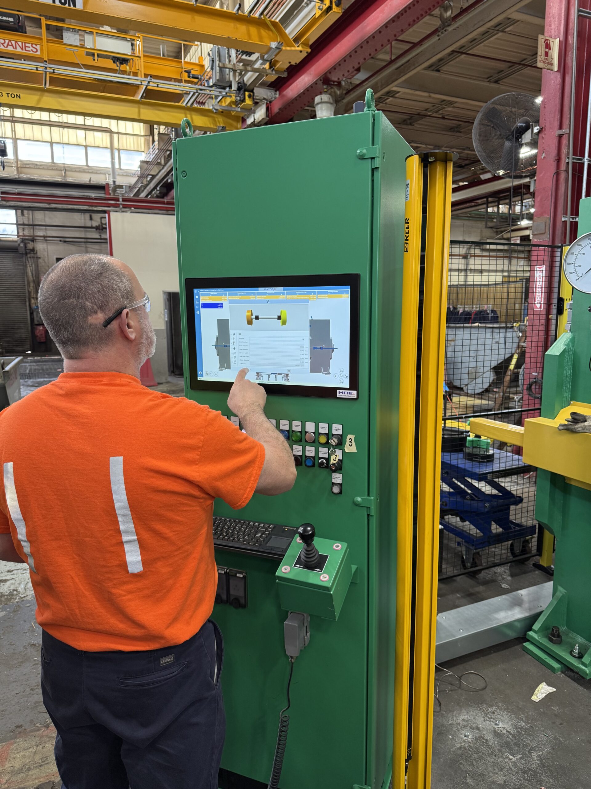MBTA technician learning to set parameters for a new wheelset