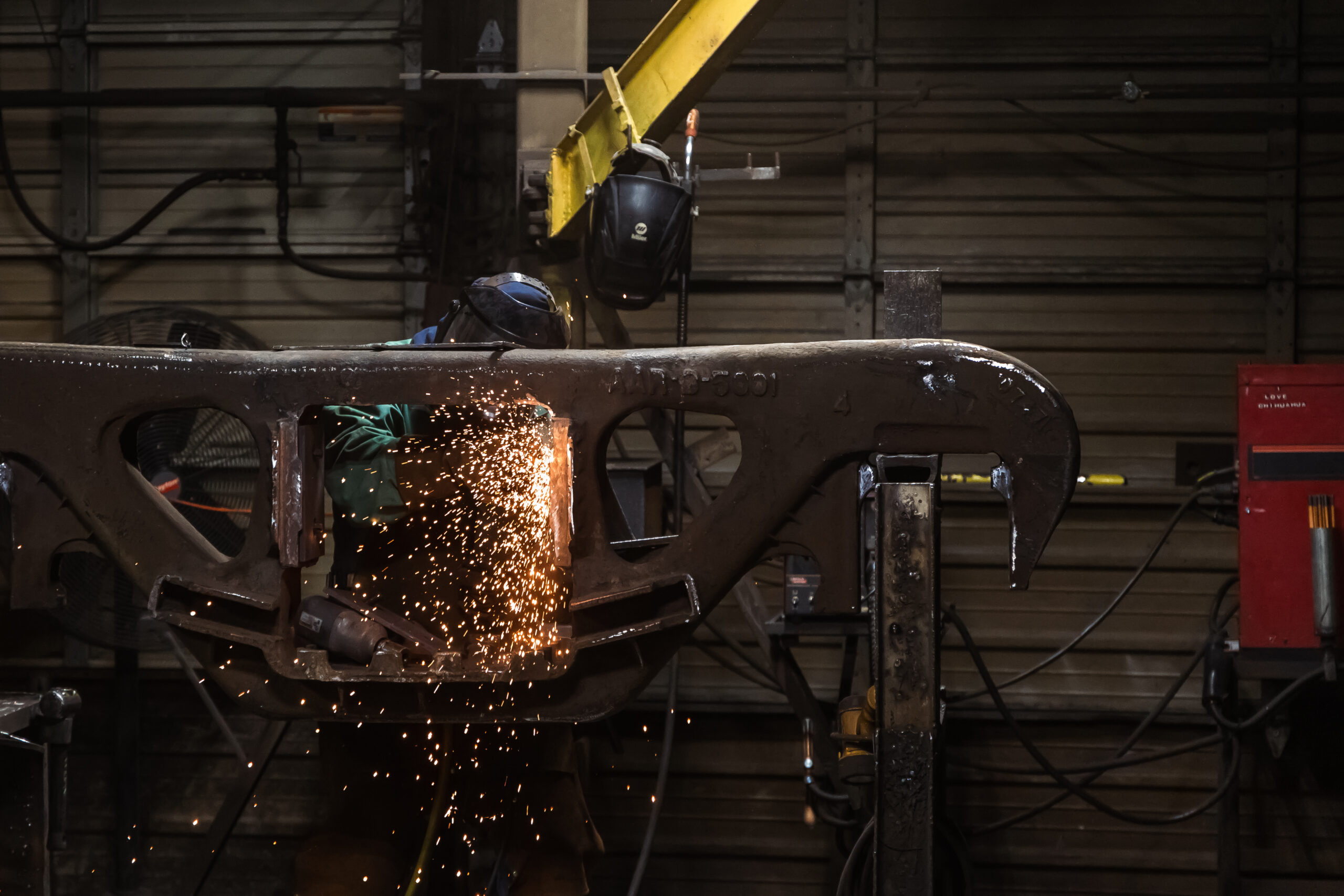 COMET Welder works to recondition a railcar side frame