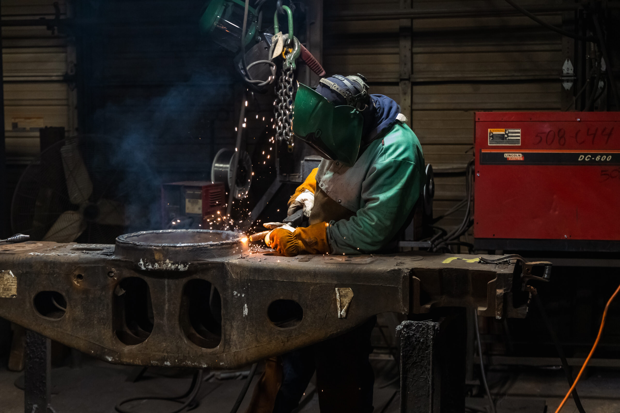 COMET Welder works to recondition a railcar bolster