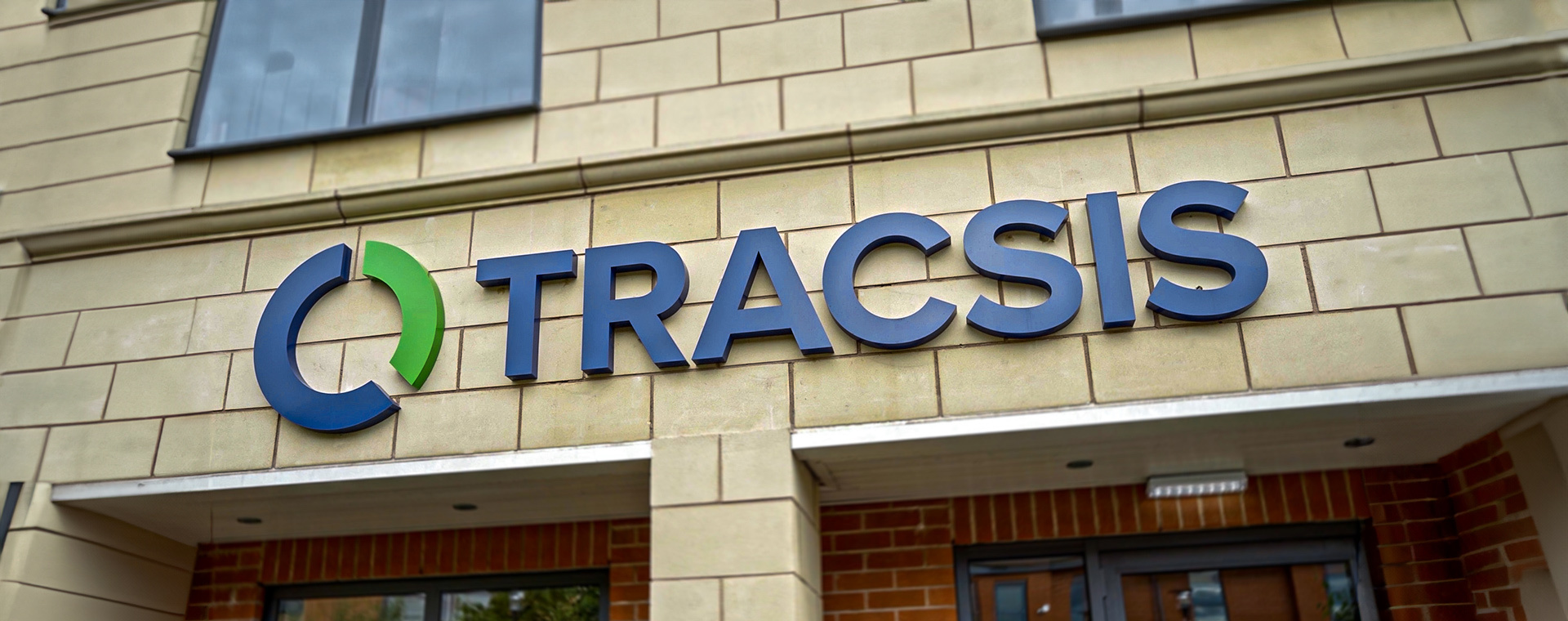 Tracsis logo on the side of a building