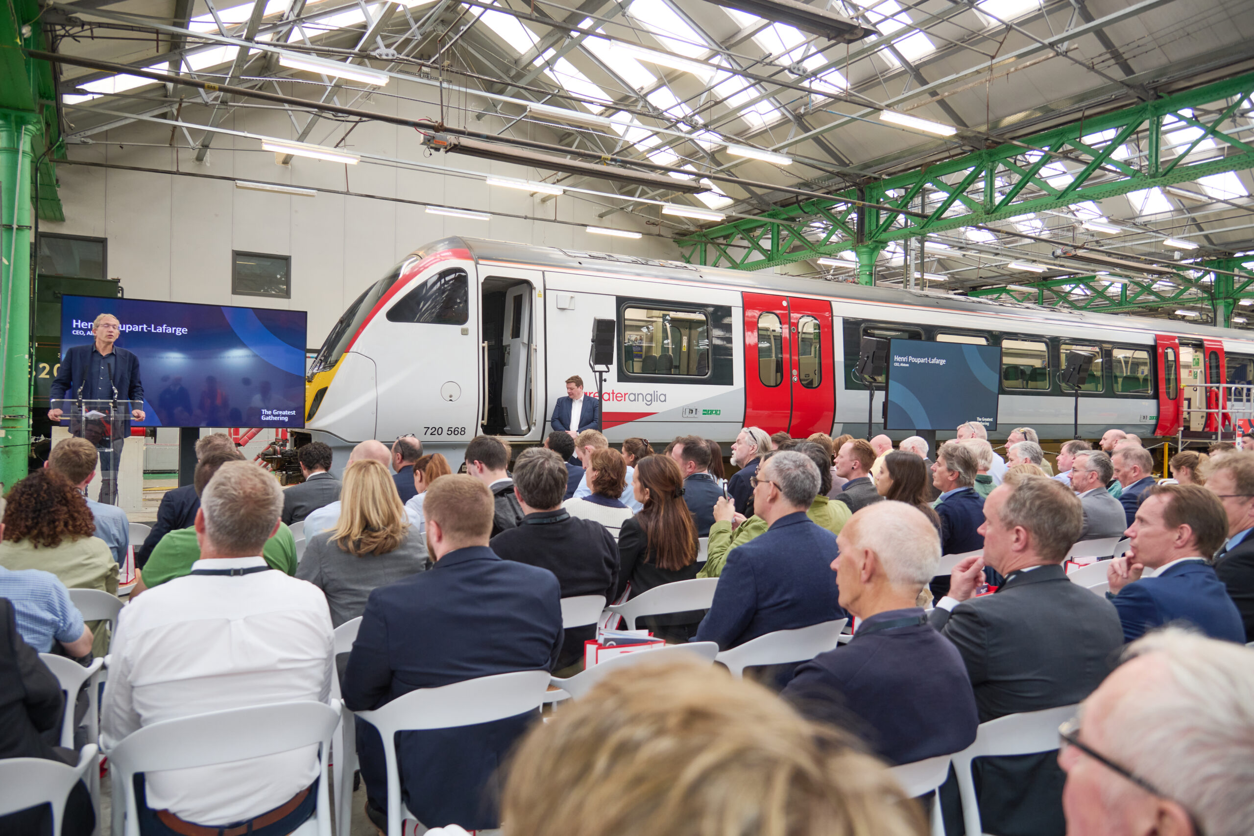 Speaker introducing the event, Alstom CEO Henri Popart-Lafarge, addressing a crowd