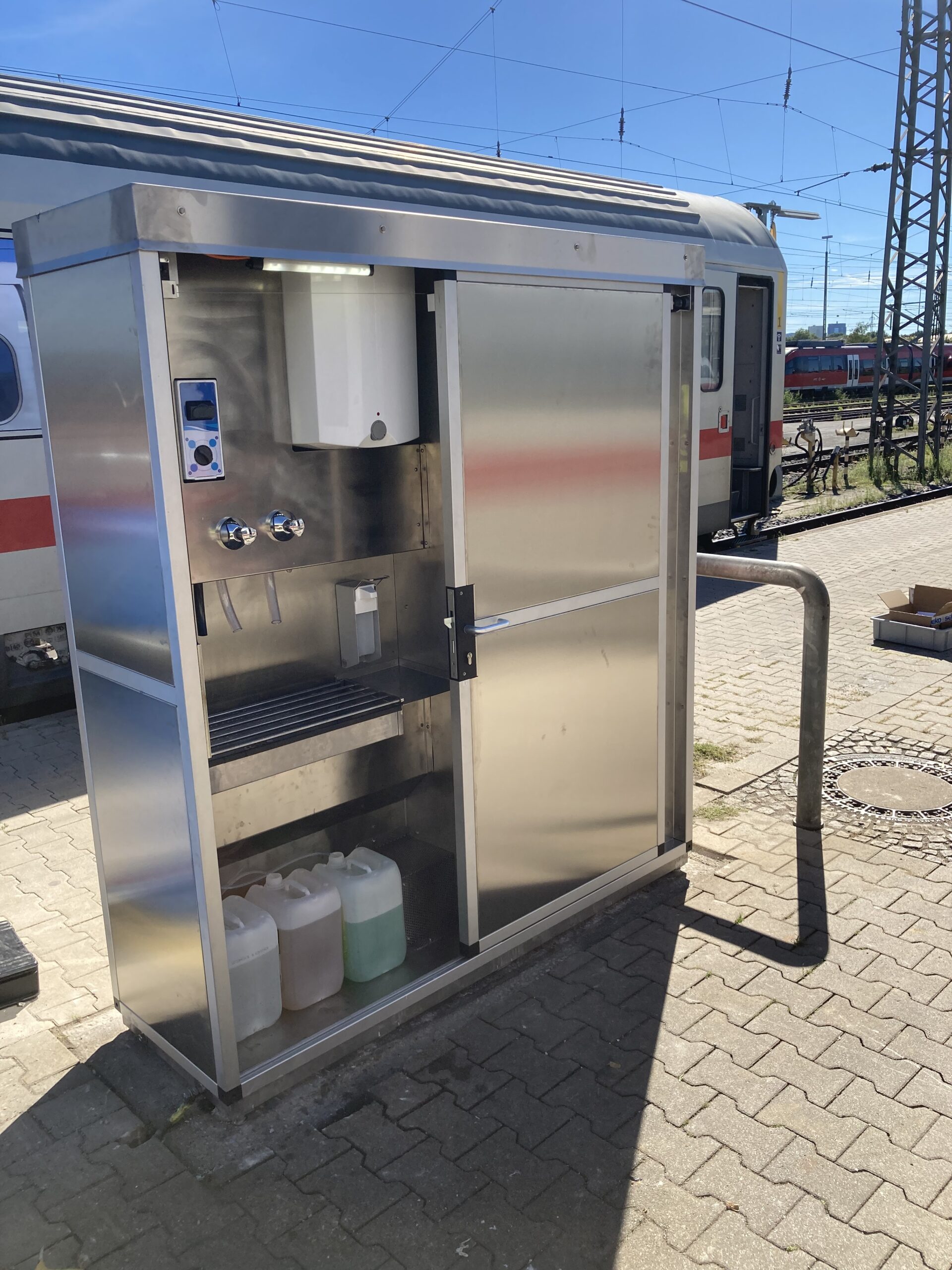 Stainless Steel Cabinet with self-closing sliding doors in Dortmund, Germany (DB)