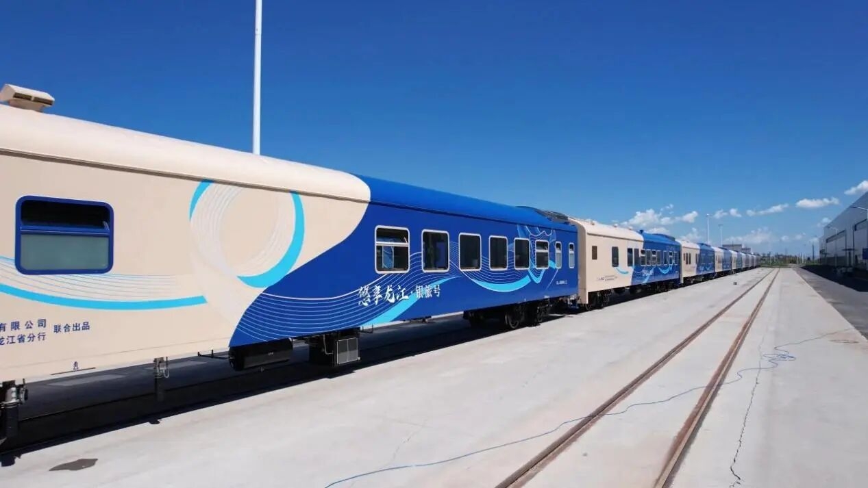 The blue and white YINLV Tourist Train from CRRC