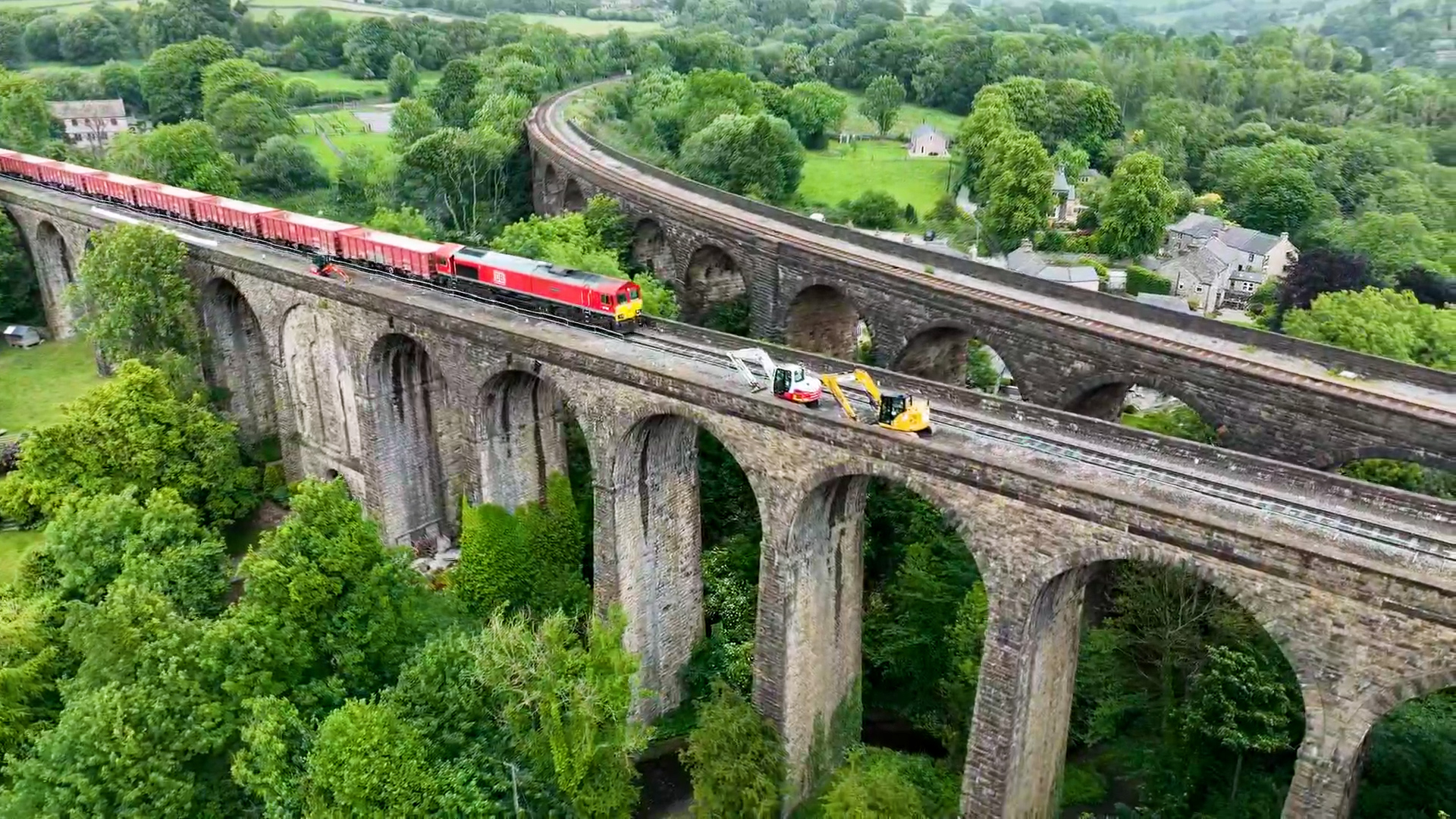 A freight train passenger over Chapel Milton viaduct June 2025