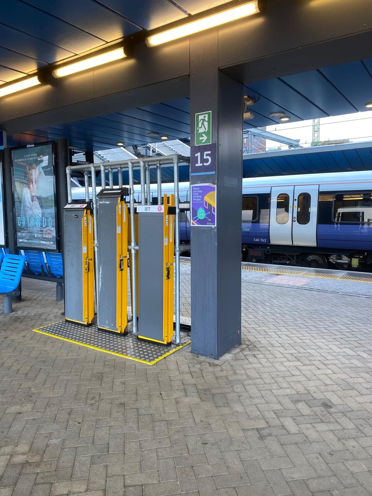 Accessibility ramps stored on a train station platform