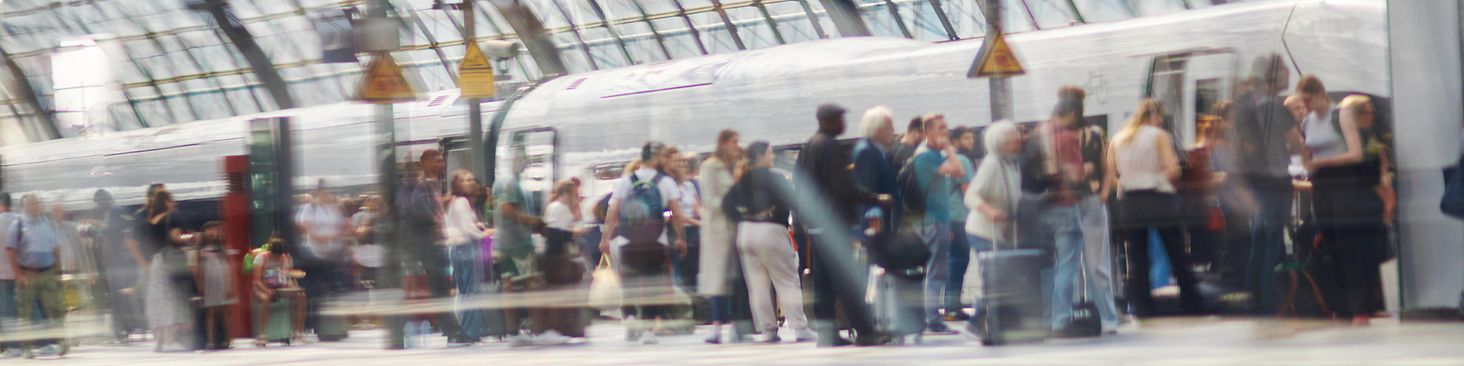 People crowding onto a train