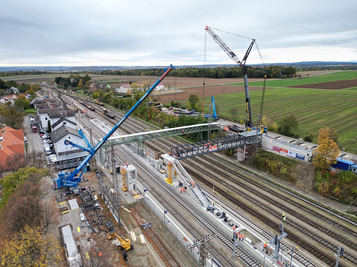 The bridge being lifted into place