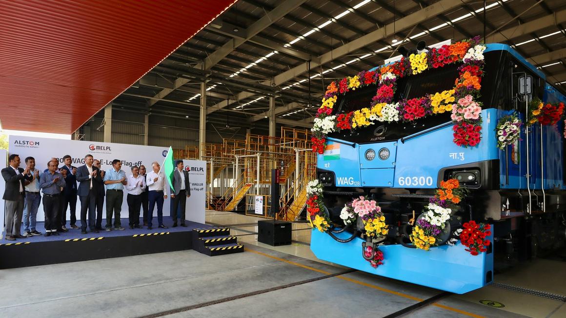 A freight train being flagged off