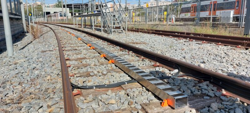 Passive “ruler” type balise installed on the track bed