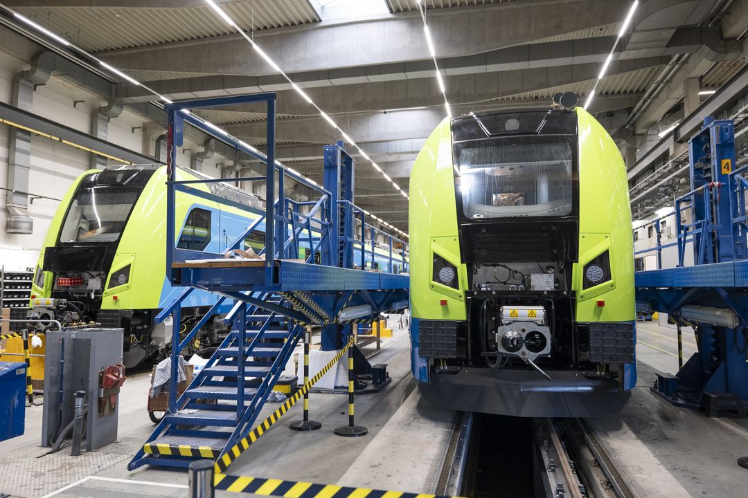 Two trains in a manufacturing depot