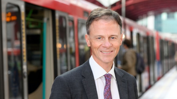 John Larkinson by a train