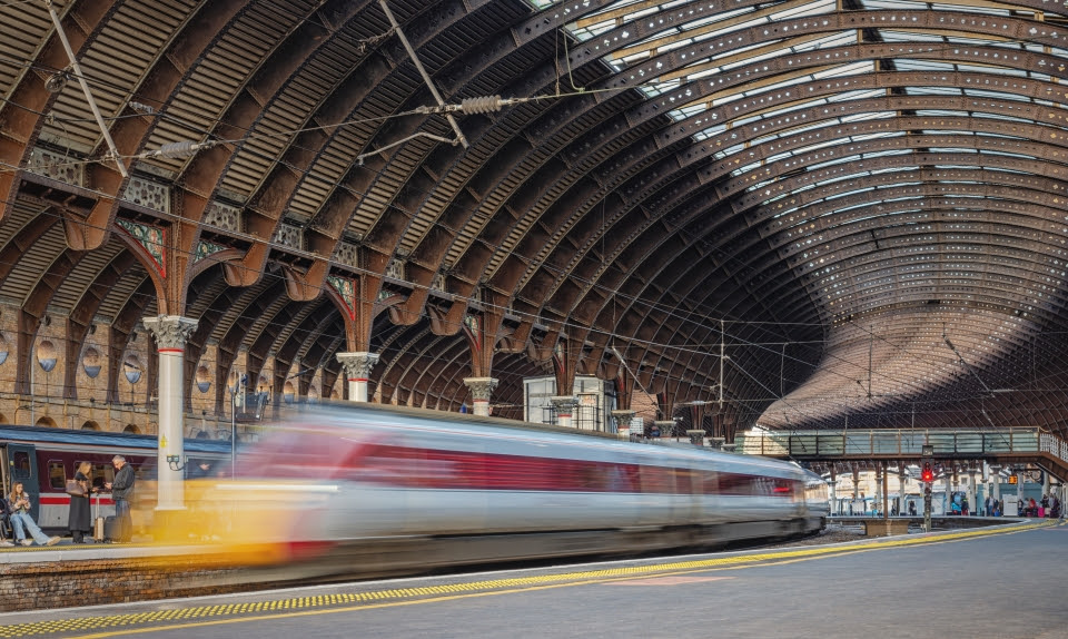 A train speeding through a station