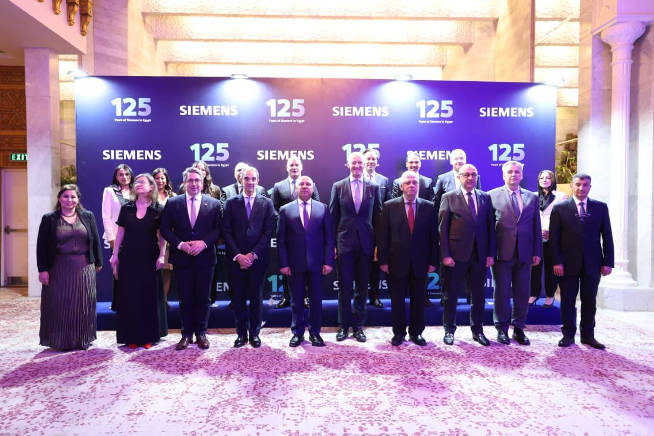 A group of people stood on ceremony