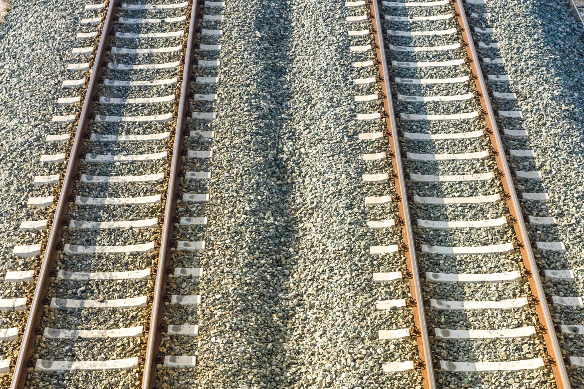 The scope of work involves the design and comprehensive rehabilitation of two sections within the Craiova-Drobeta Turnu Severin-Caransebeș railway network