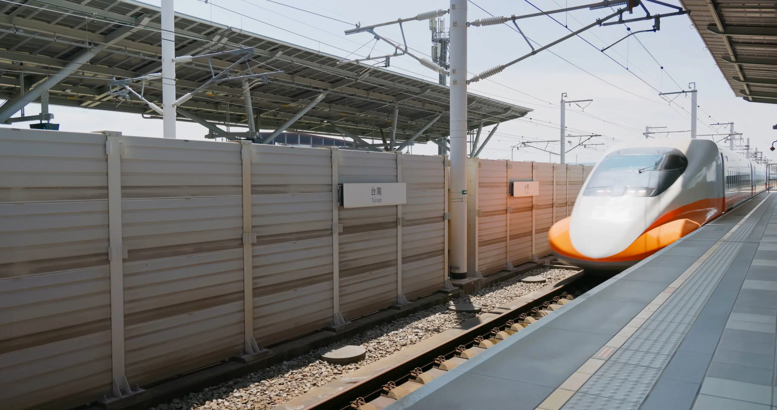 A Mitsubishi Heavy Industries N700T train, derived from the Shinkansen Type N700S, enters Tainan station and will be modernised