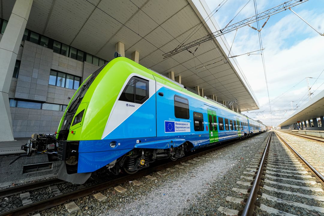 An electric train, green and blue