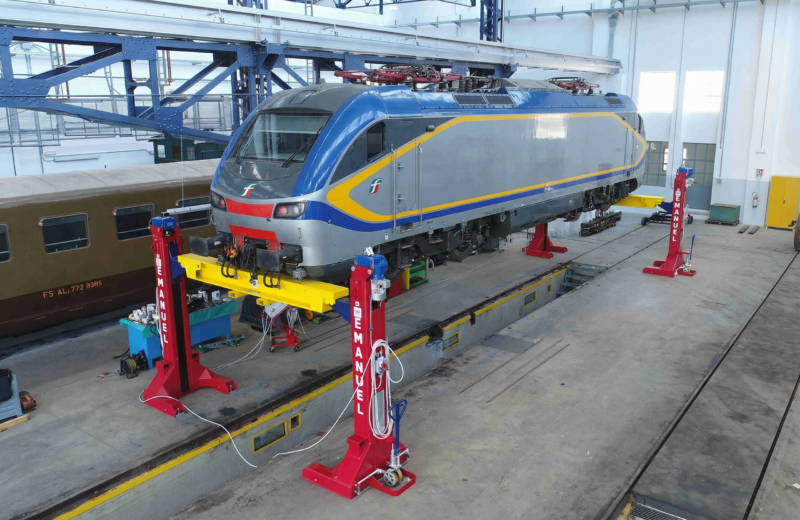 Train raised with lifting equipment