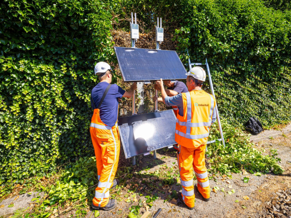 Two workmen in high-vis